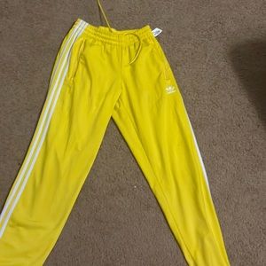 Yellow adidas sweat pants